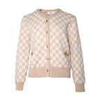Beige and white checkered cardigan on a white background