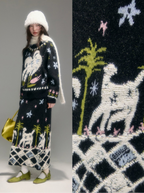 Person wearing a patterned outfit with a close-up of the fabric design.