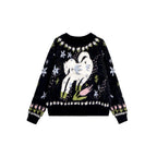 Black sweater with colorful designs on a white background