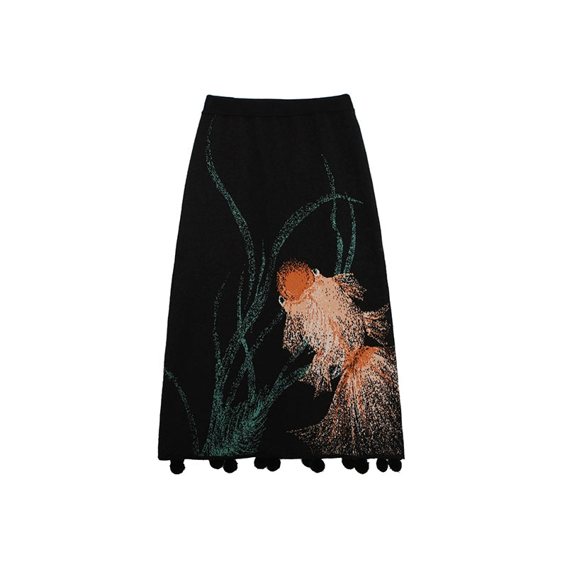Black skirt with goldfish design on a white background