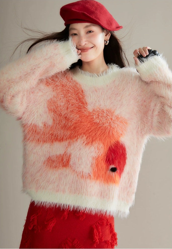 Person wearing a fluffy sweater with a floral pattern and a red cap against a neutral background
