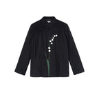 Black coat with floral embroidery on a white background