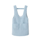 Light blue sleeveless top with two front pockets on a white background